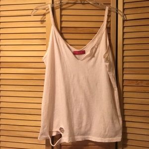 100% cotton. V-neck tee. Apparel with purpose.